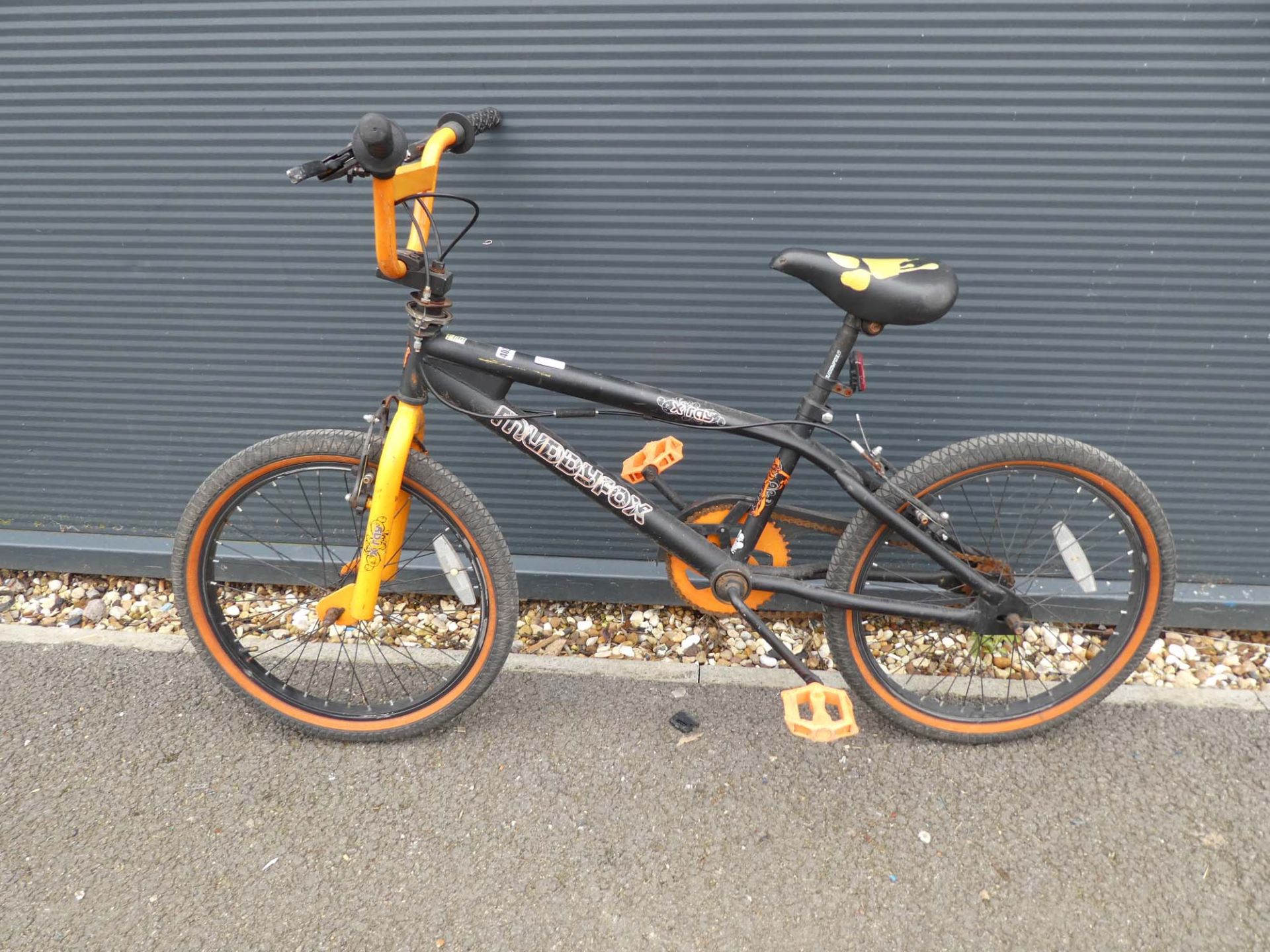 Muddy Fox BMX bike in black and orange