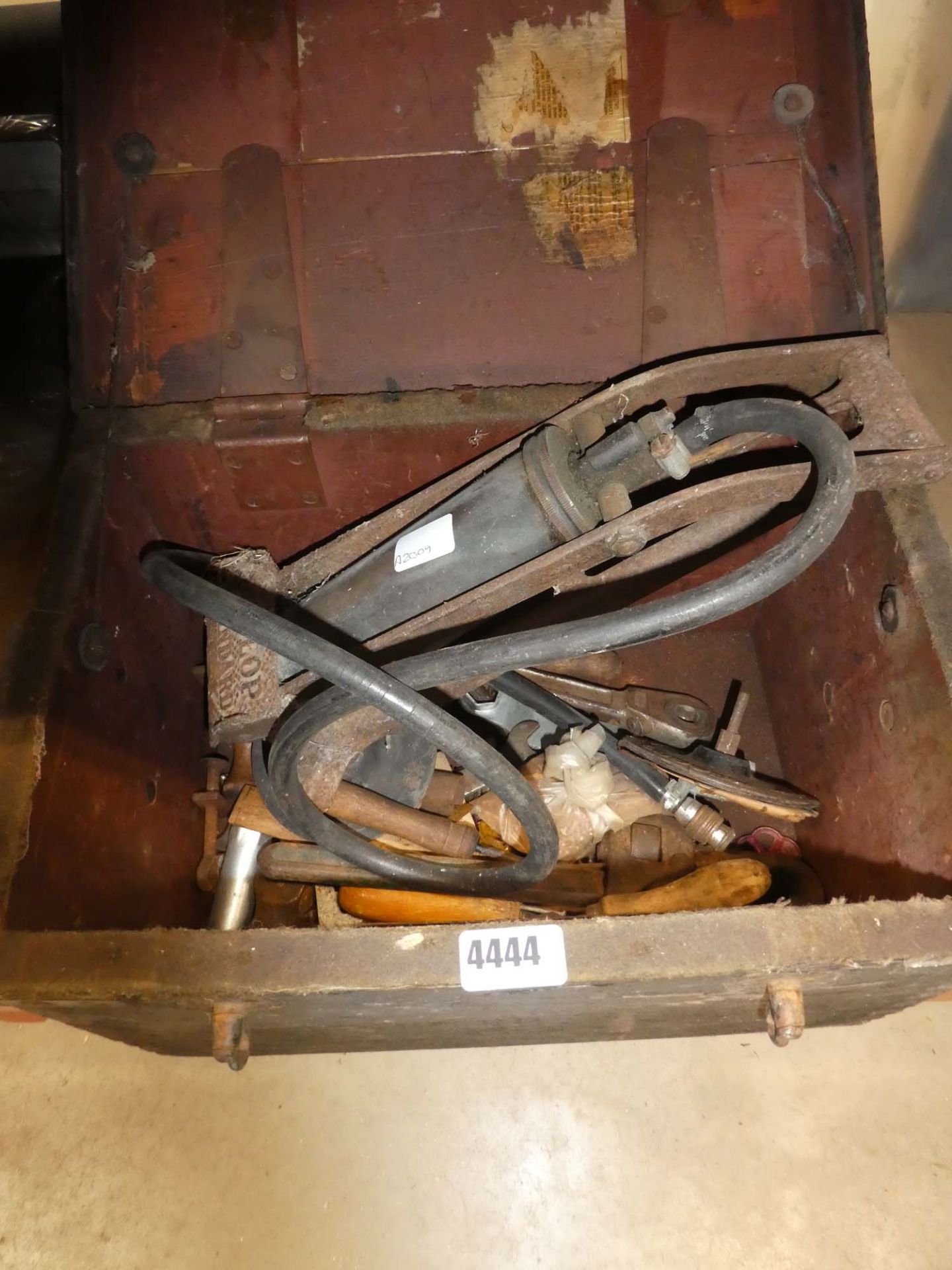 Wooden box of assorted tooling incl. Dunlop foot pumps, wrenches, files etc.