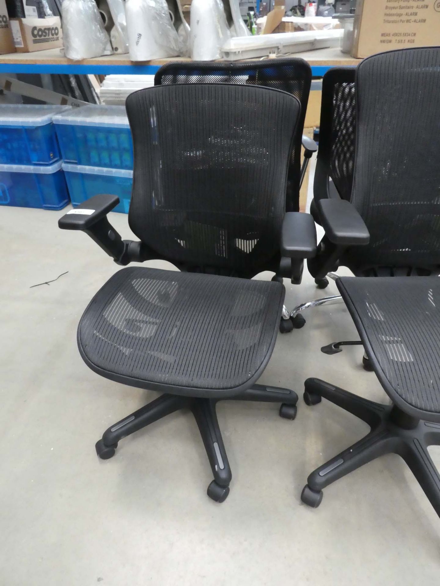 Black mesh operators chair on black base