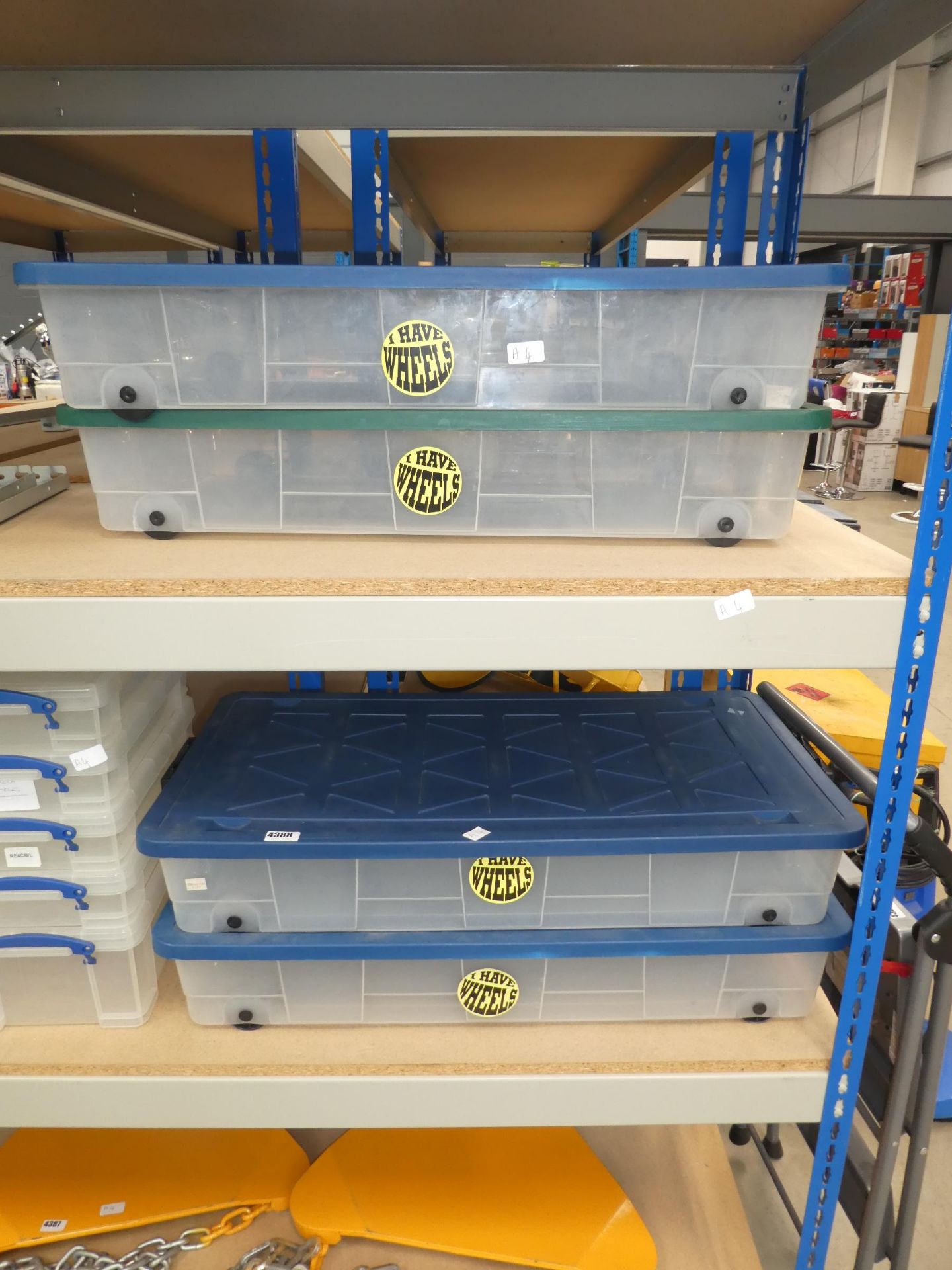 4 large underbed wheeled storage containers