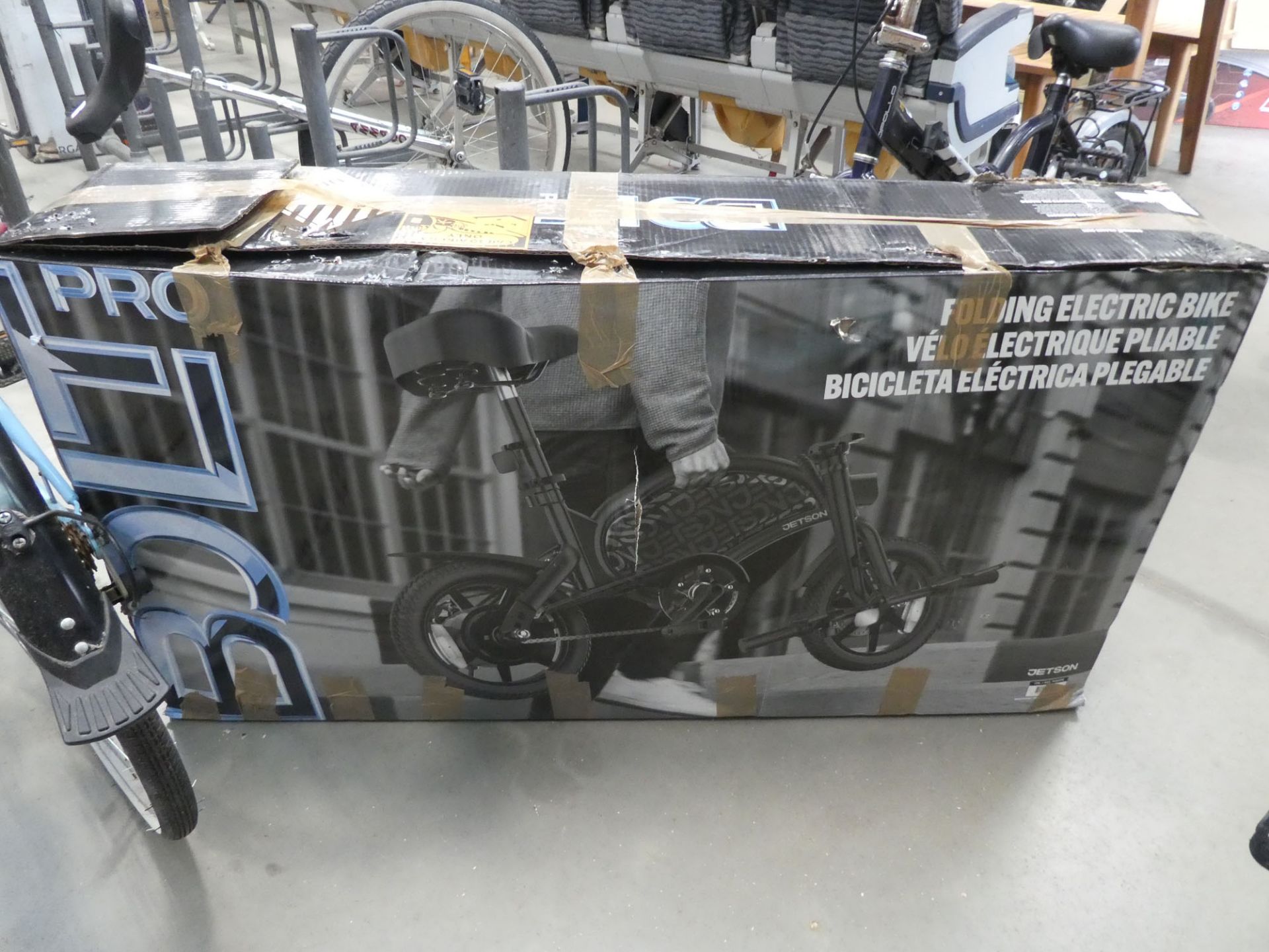 Boxed Jetson Bolt electric cycle with charger