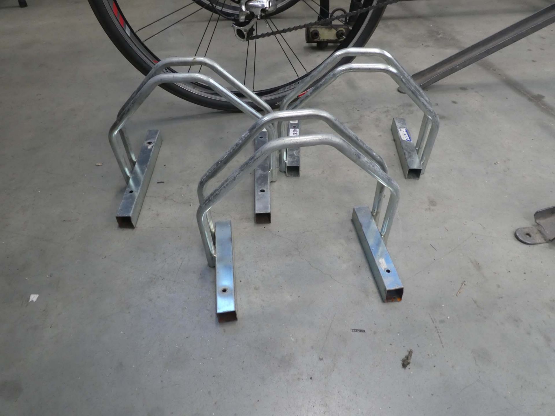 Three small bike stands