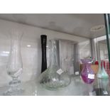 Shelf with a quantity of glass vases