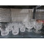 Cage containing cut glass tumblers and sundae dishes