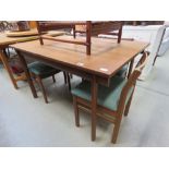 Teak extending dining table plus four chairs