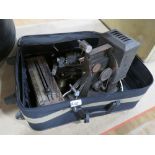 5737 Suitcase with vintage film projectors