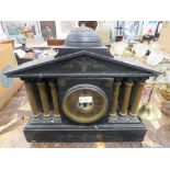 Slate mantle clock with columns to the side