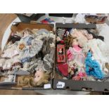 2 boxes containing porcelain dolls