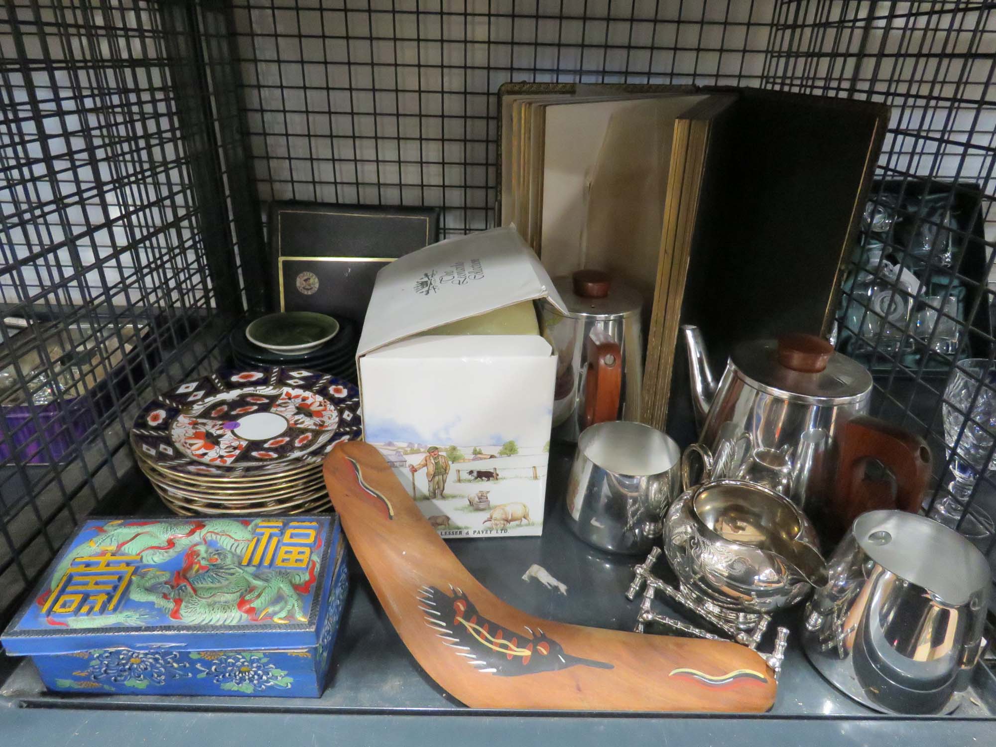 Cage containing Oriental box, ornamental boomerang, Crown Derby style plates, stainless steel tea