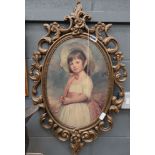 Oval print of a young girl in decorative frame