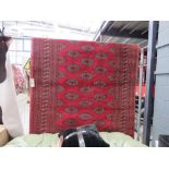 (17) Red Bokhara style carpet