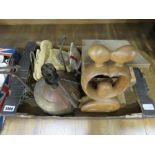 Box containing a vintage telephone, carved wooden kissing figure, a paraffin stove and various