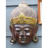 Carved wooden Buddha's head
