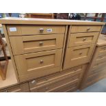 Pair of beech effect 3 drawer bedside cabinets