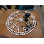 Quartz metal wall clock plus a vintage fan (as found)