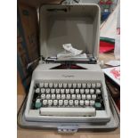 Vintage Olympia cased typewriter