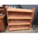 Pine rack with four sloping shelves