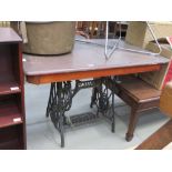 Table with Singer sewing machine base