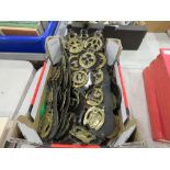 Box containing martingales and horse brasses