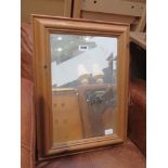Rectangular bevelled mirror in pine frame