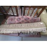 Bokhara pink carpet runner plus an olive green floral mat