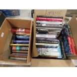 2 boxes containing dictionaries, childrens novels and reference books