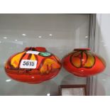 2 orange glazed Poole pottery vases