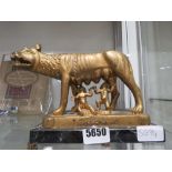 Figure of Romulus and Remus plus the she-wolf on marble base