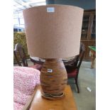 Composite wooden lamp with brown fabric shade