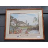 Framed print of a country cottage