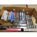 Box containing video cassettes