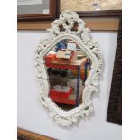 (65) Mirror in decorative cream frame