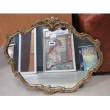 Mirror in decorative gilt frame