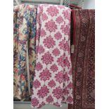 Pair of beige and maroon floral patterned curtains