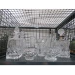 Cage containing decanters and cut glass vases