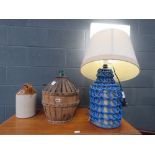 (78 & 92) Table lamp with painted rattan base plus a two tone flagon