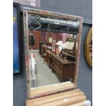 Rectangular bevelled mirror in floral frame