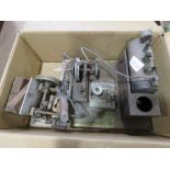 Box containing vintage toy engines