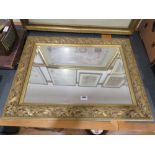 Rectangular bevelled mirror in decorative floral frame