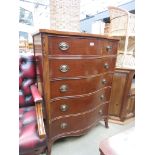 Reproduction mahogany serpentine fronted chest of 5 drawers