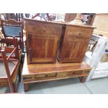 Mexican pine coffee table together with a matching pair of pot cupboards