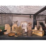 Cage containing mother of pearl opera glasses, onyx book ends, hardstone figures and photograph