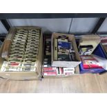 4 boxes containing die cast cars