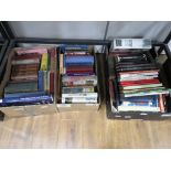 3 boxes containing novels and reference books