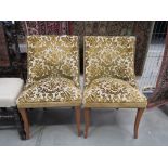 Pair of gold and green floral upholstered chairs