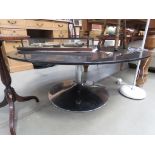 Black glazed circular coffee table with chromed base