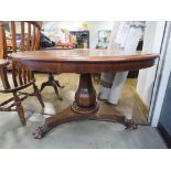 Victorian mahogany tilt top supper table on claw feet