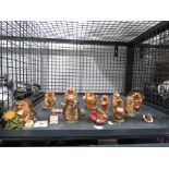 Cage containing a quantity of ornamental Hedgies hedgehog figures