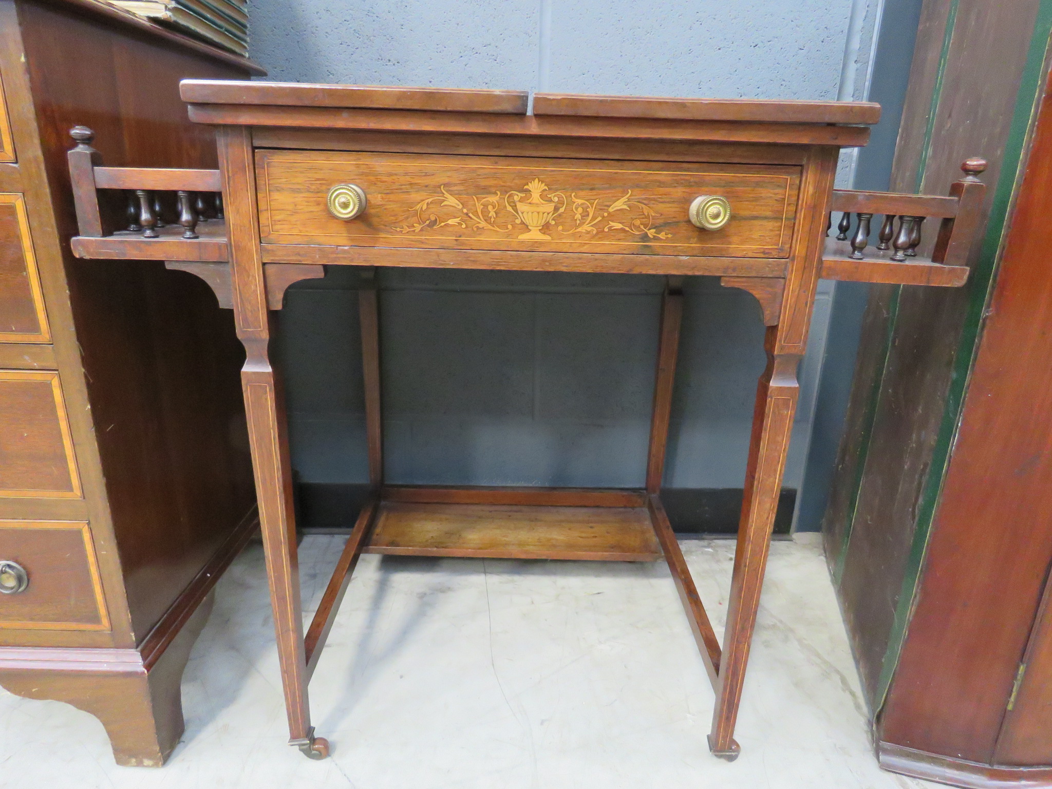 Edwardian rosewood and marquetry writing table with a folding top