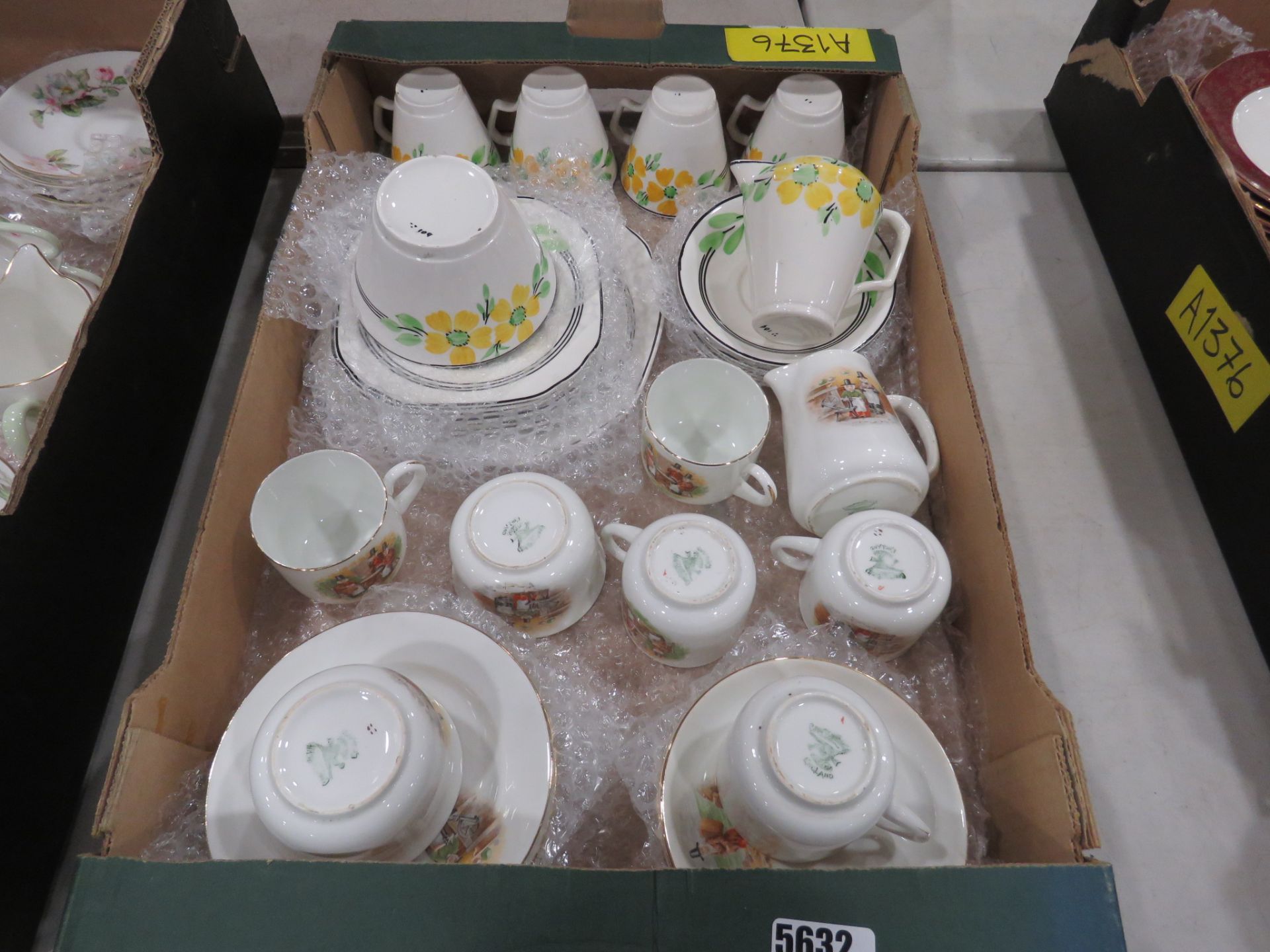 Box containing Marigold patterned crockery